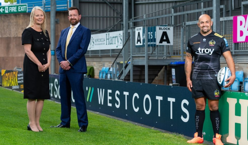 Shona Godefroy, Iain Andrews from Westcotts and Exeter Chiefs player Ben Moon.
